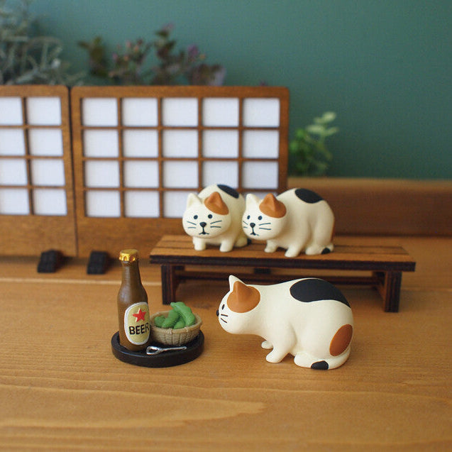 Suspicious Cat Figure