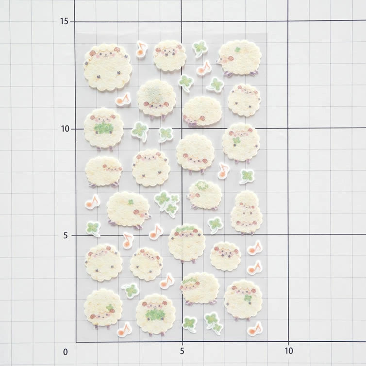Set of decorative stickers on a grid background